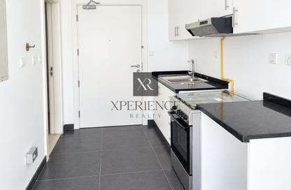 Apartment - Studio - 1 for sale in Golf Promenade 3A - Golf Promenade 3 - Golf Town - Damac Hills - Dubai
