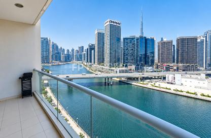 Apartment - 1 - 1 for rent in Mayfair Residency - Business Bay - Dubai