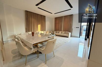 Villa - 5 - 7 for sale in Orchid Towers - Tiger Downtown Ajman - Al Alia - Ajman