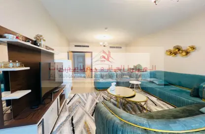 شقة - غرفة نوم - 2 حمامات للايجار في برج منازل 5 - شارع التعاون - التعاون - الشارقة