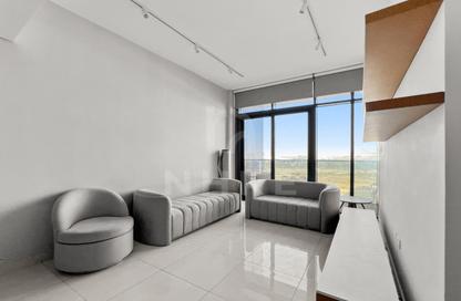 Apartment - 1 Bedroom - 2 Bathrooms for sale in Blue Waves Tower - Dubai Land Residence Complex - Dubai