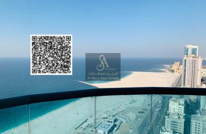 Apartment - 2 Bedrooms - 3 Bathrooms for sale in Corniche Tower - Ajman Corniche Road - Ajman