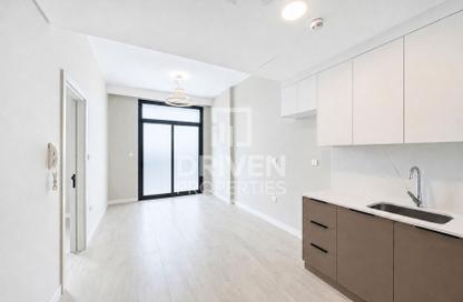Apartment - 1 - 2 for sale in Rukan Residence - Rukan - Dubai