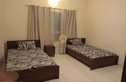 Apartment - 2 Bedrooms - 3 Bathrooms for sale in Orient Tower 1 - Orient Towers - Al Bustan - Ajman