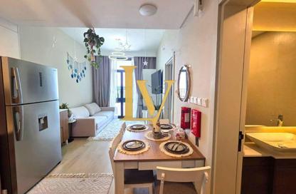 Apartment - 1 - 2 for sale in Rukan Residence - Rukan - Dubai