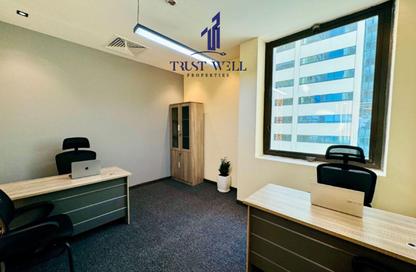 Business Centre - Studio - 4 Bathrooms for rent in Dar Al Salam Building - Corniche Road - Abu Dhabi