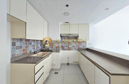 Apartment - 2 Bedrooms - 3 Bathrooms for rent in Rabdan Building - Motor City - Dubai