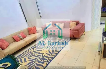 شقة - غرفة نوم - 2 حمامات للبيع في أورينت تاور 1 - أورينت تاور - البستان - عجمان