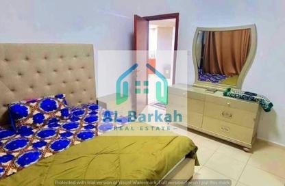 شقة - غرفة نوم - 2 حمامات للبيع في أورينت تاور 1 - أورينت تاور - البستان - عجمان