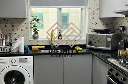 Apartment - 1 Bedroom - 2 Bathrooms for sale in Tower C1 - Ajman Pearl Towers - Ajman Downtown - Ajman