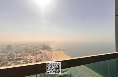 Apartment - 1 Bedroom - 2 Bathrooms for sale in Corniche Tower - Ajman Corniche Road - Ajman