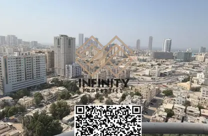 شقة - غرفة نوم - 2 حمامات للبيع في أورينت تاور 1 - أورينت تاور - البستان - عجمان