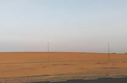 أرض - استوديو للبيع في العذيب - ضاحية الرويضات - الشارقة