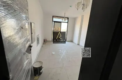 Apartment - 1 Bedroom - 1 Bathroom for rent in Orchid Towers - Tiger Downtown Ajman - Al Alia - Ajman