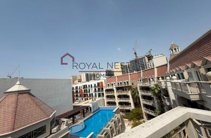 Apartment - 1 Bedroom - 2 Bathrooms for rent in Le Grand Chateau B - Le Grand Chateau - District 10 - Jumeirah Village Circle - Dubai