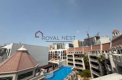 Apartment - 1 Bedroom - 2 Bathrooms for rent in Le Grand Chateau B - Le Grand Chateau - District 10 - Jumeirah Village Circle - Dubai