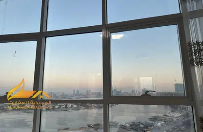 شقة - غرفة نوم - 2 حمامات للبيع في أورينت تاور 1 - أورينت تاور - البستان - عجمان