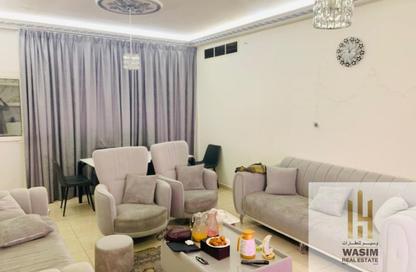 Apartment - 2 Bedrooms - 2 Bathrooms for sale in Orient Tower 1 - Orient Towers - Al Bustan - Ajman