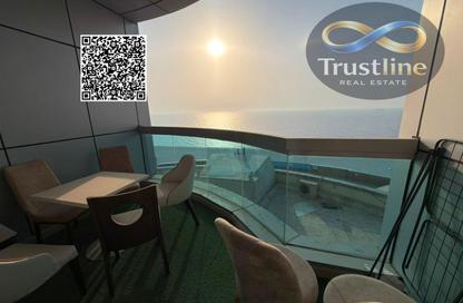 Apartment - 2 Bedrooms - 4 Bathrooms for sale in Corniche Tower - Ajman Corniche Road - Ajman