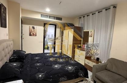 Apartment - Studio - 1 for rent in Corniche Tower - Ajman Corniche Road - Ajman