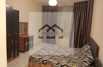Apartment - 2 Bedrooms - 2 Bathrooms for sale in Orient Tower 1 - Orient Towers - Al Bustan - Ajman