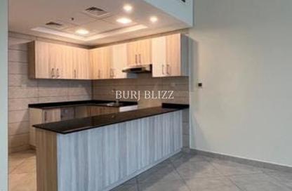 Apartment - Studio - 1 Bathroom for rent in Chaimaa Premiere - District 15 - Jumeirah Village Circle - Dubai