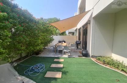 Townhouse - 4 - 4 for rent in Noor Townhouses - Town Square - Dubai
