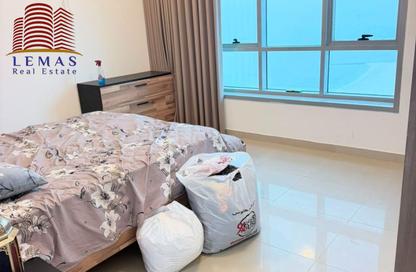 Apartment - 1 Bedroom - 2 Bathrooms for rent in Corniche Tower - Ajman Corniche Road - Ajman