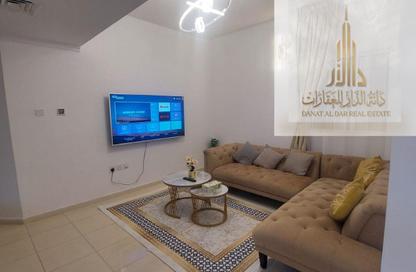شقة - غرفة نوم - 2 حمامات للايجار في أورينت تاور 1 - أورينت تاور - البستان - عجمان