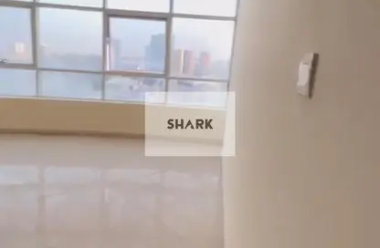 شقة - غرفة نوم - 2 حمامات للبيع في أورينت تاور 1 - أورينت تاور - البستان - عجمان