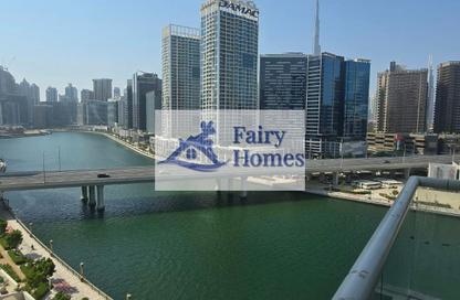 Apartment - 1 - 1 for sale in Mayfair Residency - Business Bay - Dubai