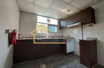 Apartment - 1 Bedroom - 2 Bathrooms for rent in Abu Shagara building - Abu shagara - Sharjah