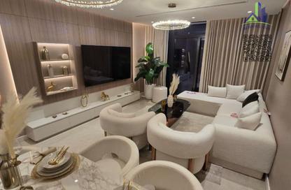Compound - 1 - 2 for sale in Orchid Towers - Tiger Downtown Ajman - Al Alia - Ajman