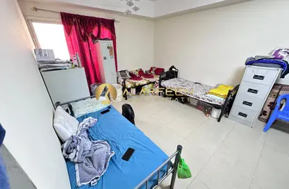 شقة - غرفة نوم - 2 حمامات للبيع في ليدي راتان مانور - منطقة مركز الأعمال - المدينة العالمية - دبي