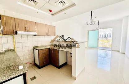 Apartment - 1 Bedroom - 2 Bathrooms for rent in I D Blu Building - International City Phase 2 - Al Warsan 4 - Al Warsan - Dubai