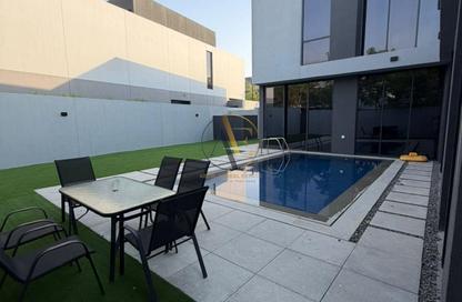 Villa - 4 Bedrooms - 5 Bathrooms for sale in Robinia - Masaar - Tilal City - Sharjah