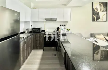 شقة - غرفة نوم - 2 حمامات للايجار في برج روكان C - برج روكان - روكان - دبي لاند - دبي