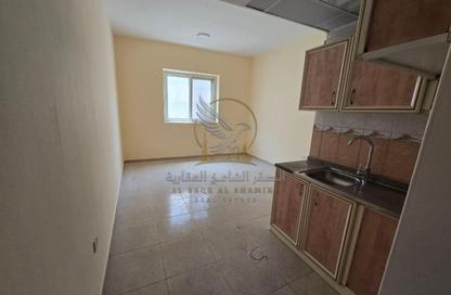 Apartment - Studio - 1 Bathroom for rent in Al Butina 9 Building - Al Butina - Sharjah