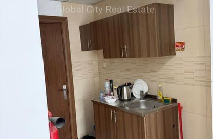 Apartment - Studio - 1 Bathroom for rent in Smart Tower 1 - Al Amerah - Ajman