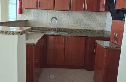 Apartment - 1 - 2 for rent in Emirates Cluster - International City - Dubai
