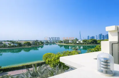 Villa - 7 Bathrooms for rent in Sector E - Emirates Hills - Dubai