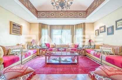 Villa - 4 Bedrooms - 5 Bathrooms for rent in Bungalow Area - Green Community Motor City - Motor City - Dubai