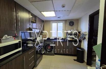 Apartment - 3 - 4 for sale in Tower 21 - Al Reef Downtown - Al Reef - Abu Dhabi