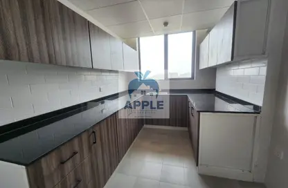 شقة - غرفة نوم - 2 حمامات للايجار في الزاهية - تجارية مويلح - الشارقة