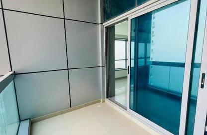 Apartment - 2 Bedrooms - 2 Bathrooms for sale in Corniche Tower - Ajman Corniche Road - Ajman
