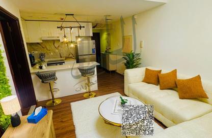 Apartment - 1 Bedroom - 1 Bathroom for sale in Mandarin Towers - Garden City - Ajman