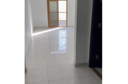 Apartment - 2 Bedrooms - 3 Bathrooms for sale in Al Ghoroub Tower - Al Alia - Ajman