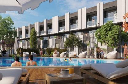 Townhouse - 2 Bedrooms - 2 Bathrooms for sale in Reportage Village 1 - Reportage Village - Dubai Land - Dubai