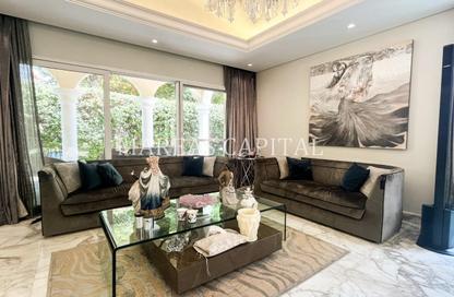 Villa - 4 Bedrooms - 5 Bathrooms for sale in Bungalow Area - Green Community Motor City - Motor City - Dubai