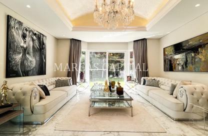 Villa - 4 Bedrooms - 5 Bathrooms for sale in Bungalow Area - Green Community Motor City - Motor City - Dubai